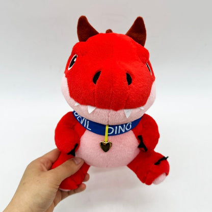 Handmade devil dinosaur plush toy with size reference
