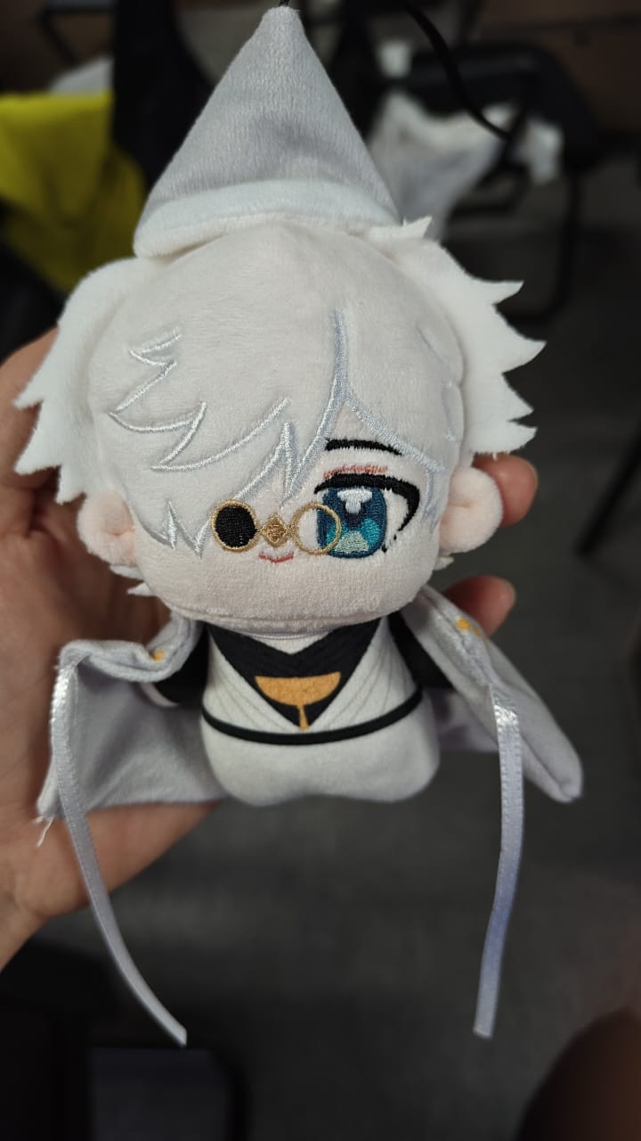 Handmade fan-inspired witch master plush toy with white hair, blue eyes, and a removable grey witch hat and cloak, 10 cm tall
