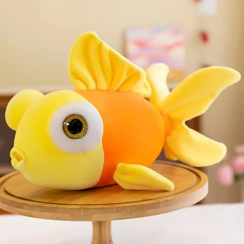 Handmade goldfish plushie yellow variant showing soft cotton texture