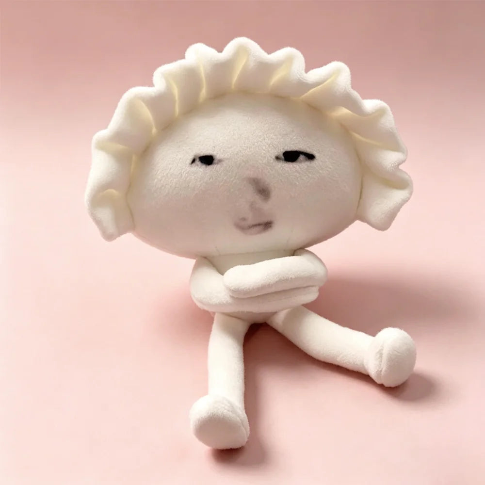 Handmade meme plush keychain shaped like a Japanese dumpling