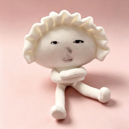 Handmade meme plush keychain shaped like a Japanese dumpling