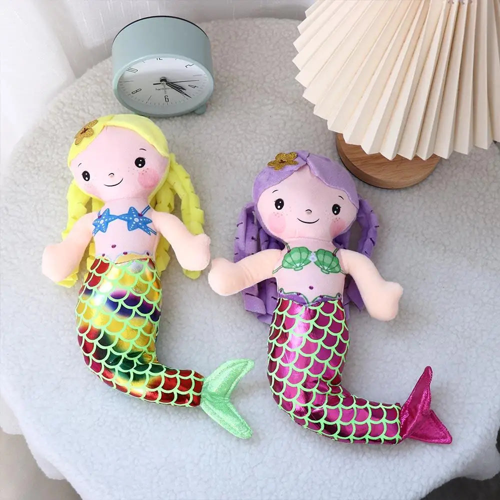 Handmade mermaid ragdoll gift-ready presentation on pastel background