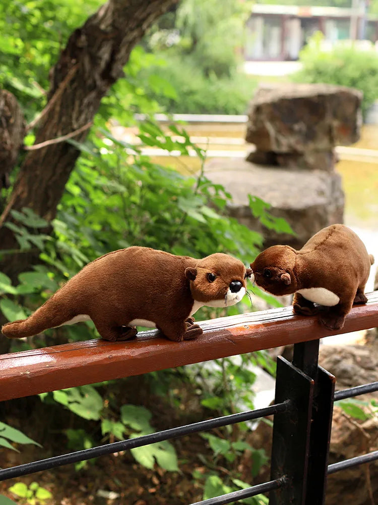 Handmade otter plush gift for adults on display shelf