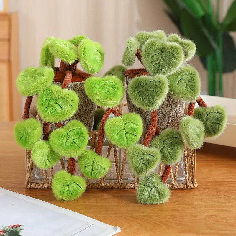 Handmade plant plushie with pothos leaf design on wooden desk decor