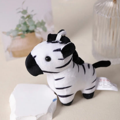Handmade plush keychain set close up stitching detail cartoon animals