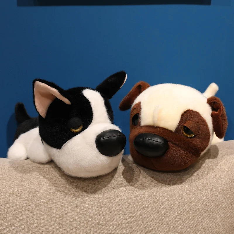 Handmade plush toy cute puppy sleeping pillow on bed close up