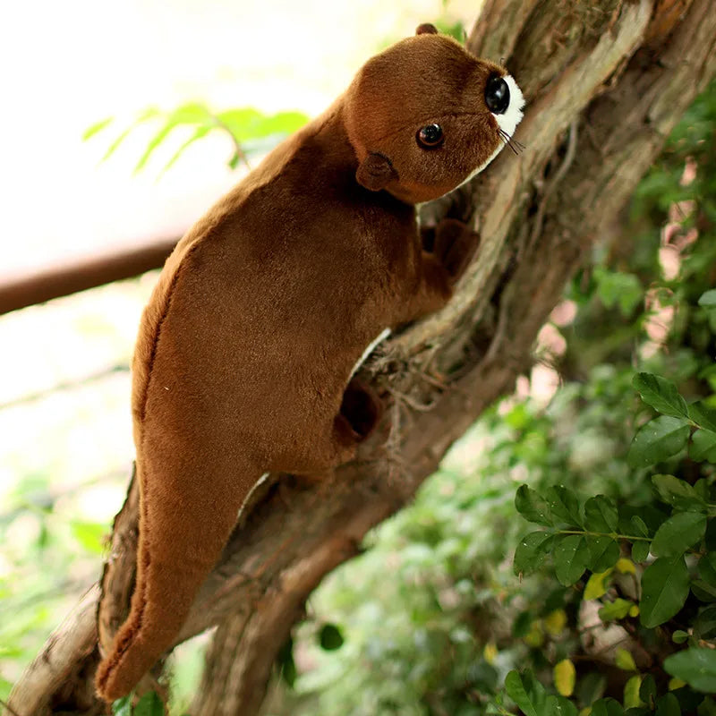 Handmade river otter stuffed animal standing pose close up
