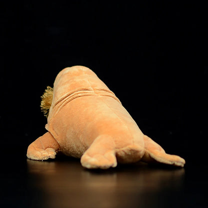 Handmade walrus plush placed next to ruler showing 30cm size