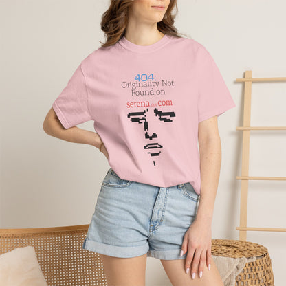 Hanging product shot of original design graphic tee on wooden hanger in natural light
