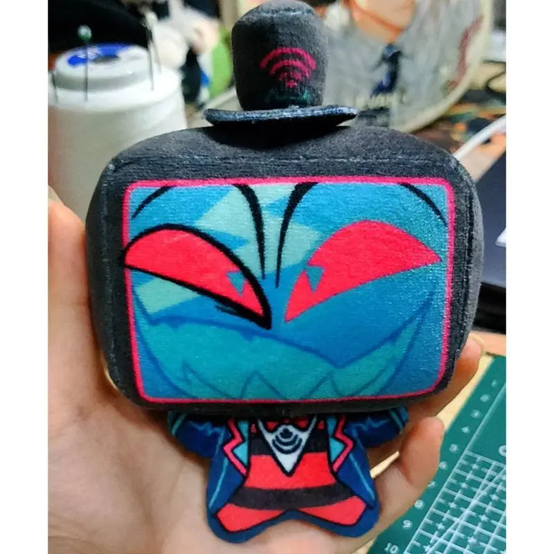 Happy fan holding their new hazbin hotel vox plush collectible.