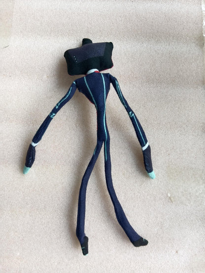 Hazbin_Hotel_Vox_stuffed_doll_showcasing_a_dark_blue_suit_with_white_trim_cyan_hands_and_a_jagged_glowing_grin_on_a_television_screen_head.supplier_update