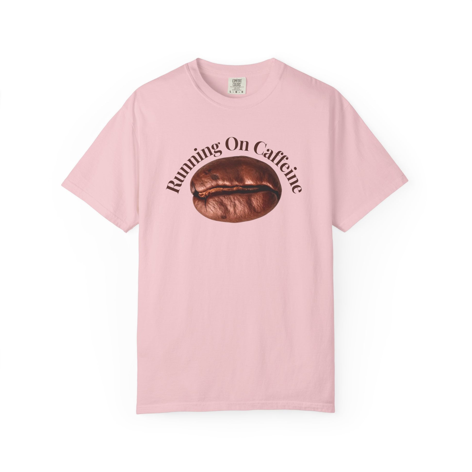 Heavyweight garment-dyed tee hanging on wooden hanger against white wall