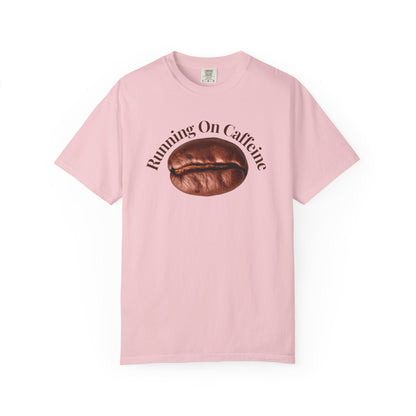 Heavyweight garment-dyed tee hanging on wooden hanger against white wall