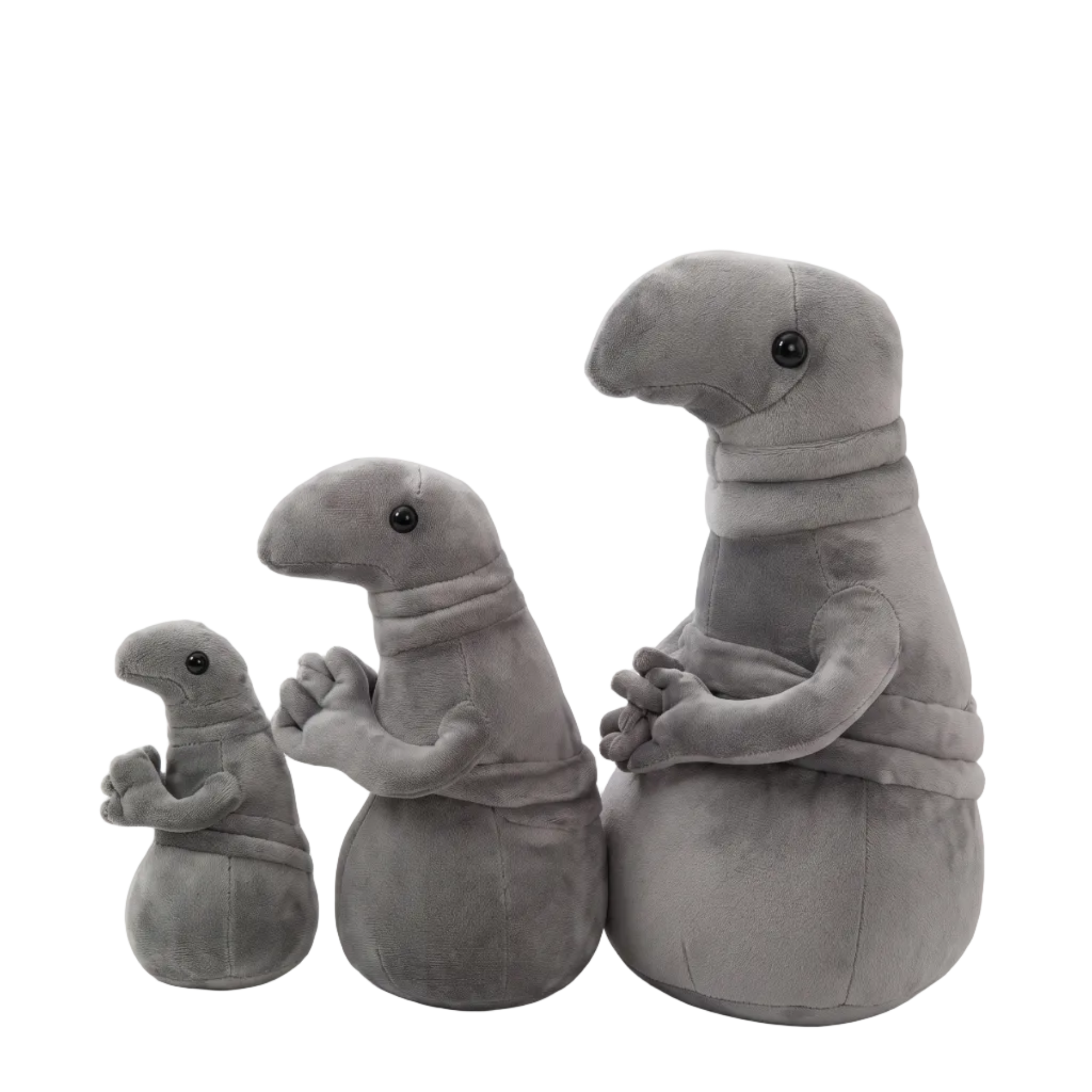 Homunculus Loxodontus plush toy sitting upright with folded arms, gray meme plushie
