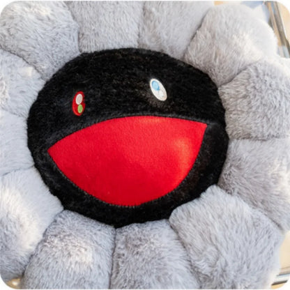 Horror plush toy with Murakami petal frame lifestyle display on shelf
