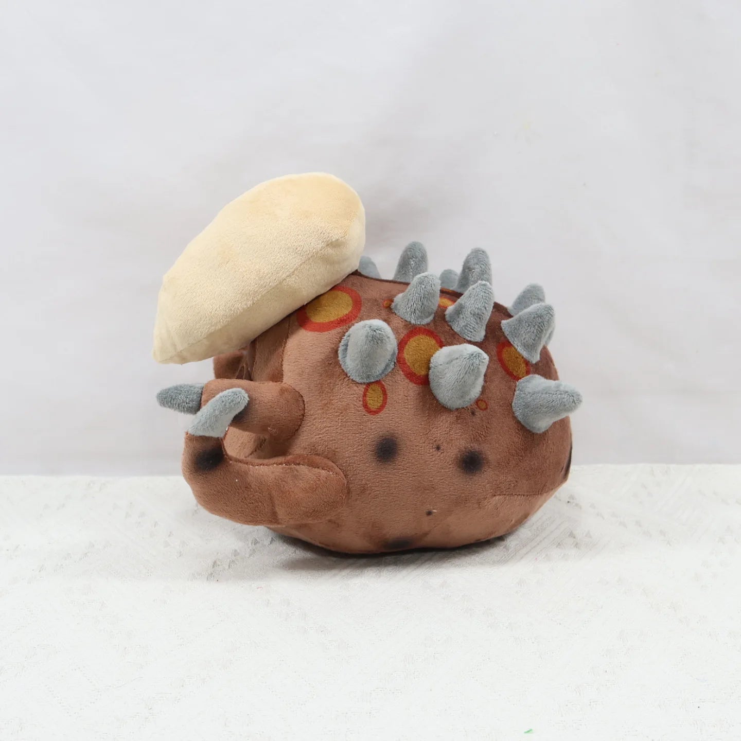 IS-0173-A Pest stuffed animal showing spiky potato silhouette detail
