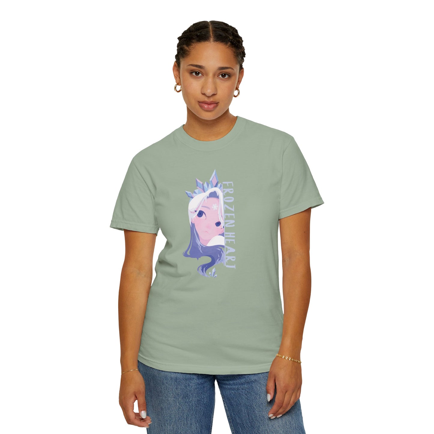 Ice blue graphic tee overhead flat lay on dark background with winter majesty frozen heart artwork
