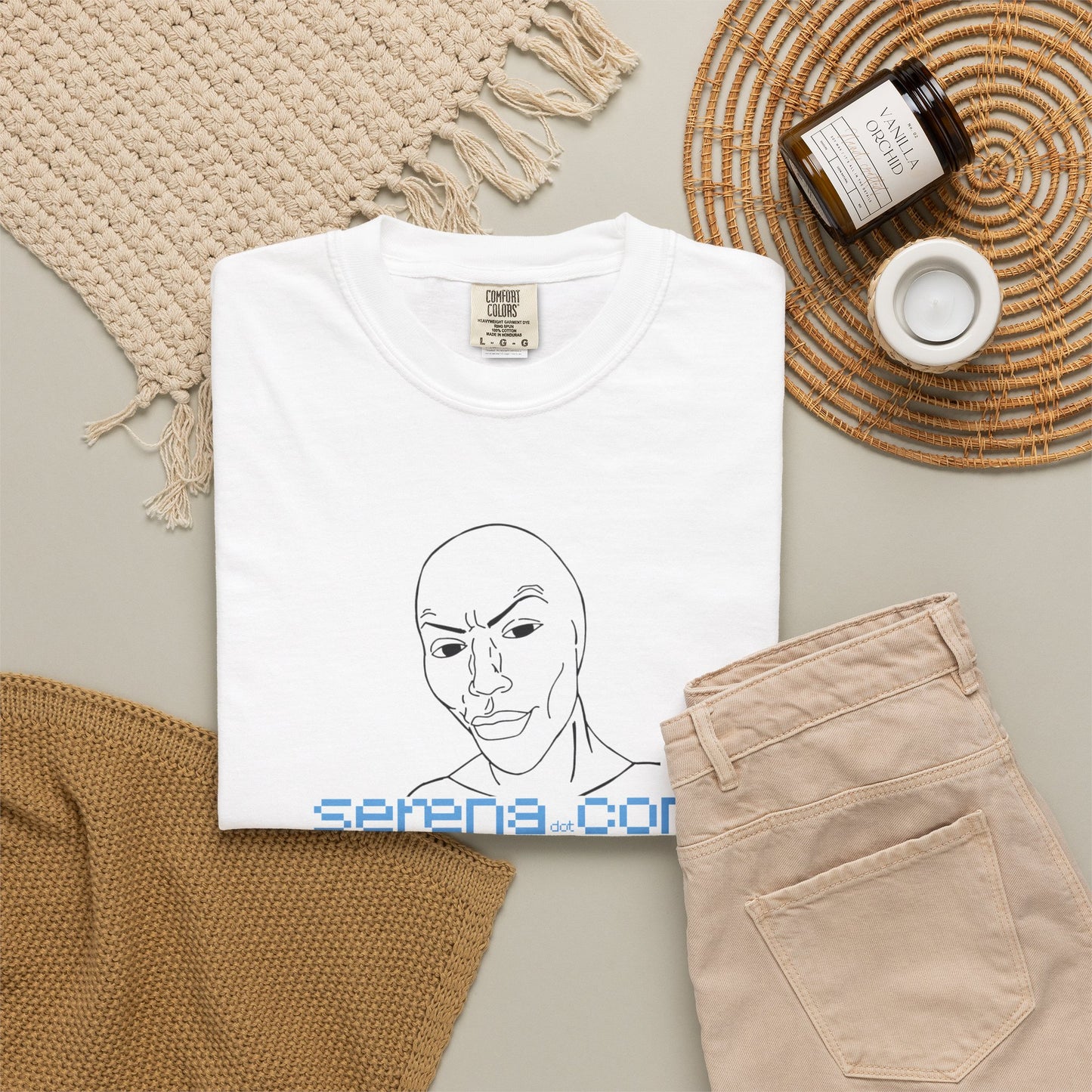 Indie designer graphic tee worn creative studio setting casual styling
