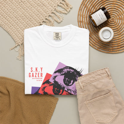 Indie graphic tshirt on female model wearing open overshirt as a layered streetwear look
