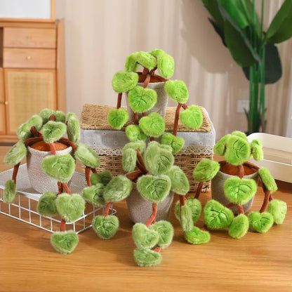 Indoor plant toy pothos plushie displayed on pastel bedroom shelf