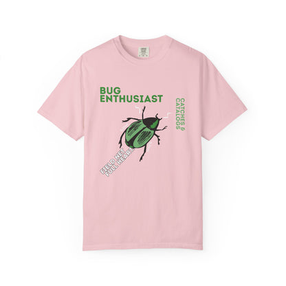 Insect lover gift idea green beetle graphic tee flat lay on wood surface