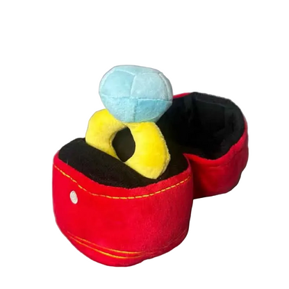 Interactive dog toy plush ring with squeaker beside soft jewelry box plush