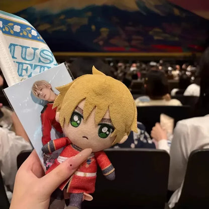 Ivan Braginsky plush closeup of face with childlike smile and ashen blonde hair
