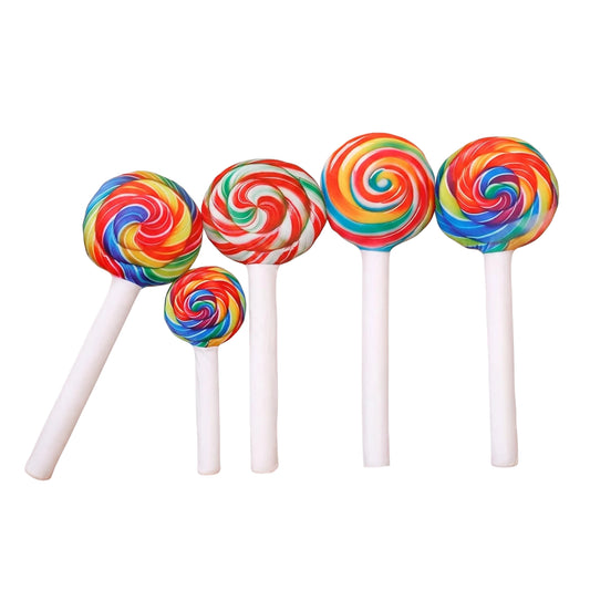 Jumbo kawaii lollipop plushie in rainbow swirl design on white background 40cm size