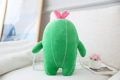 Kawaii cactus stuffed animal showing the cheerful smiling facial expression up close