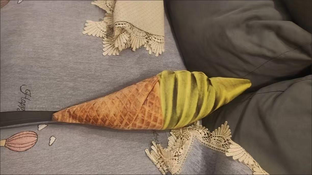 Kawaii food plushie ice cream cone stuffed toy in neapolitan flavor, pink white and brown layers