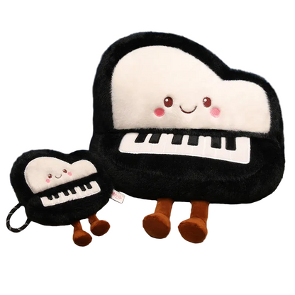 Kawaii piano plush in 33 cm grand piano throw pillow size displayed on a pastel pink bedspread