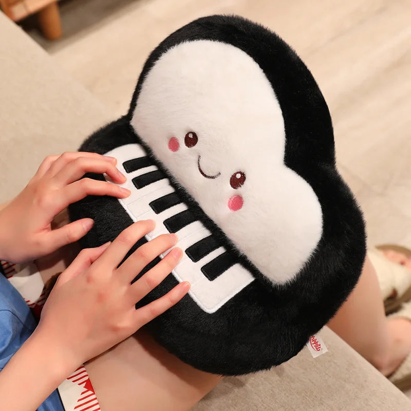 Kawaii piano plush keychain pendant in soft plush fabric showing grand piano keys detail up close