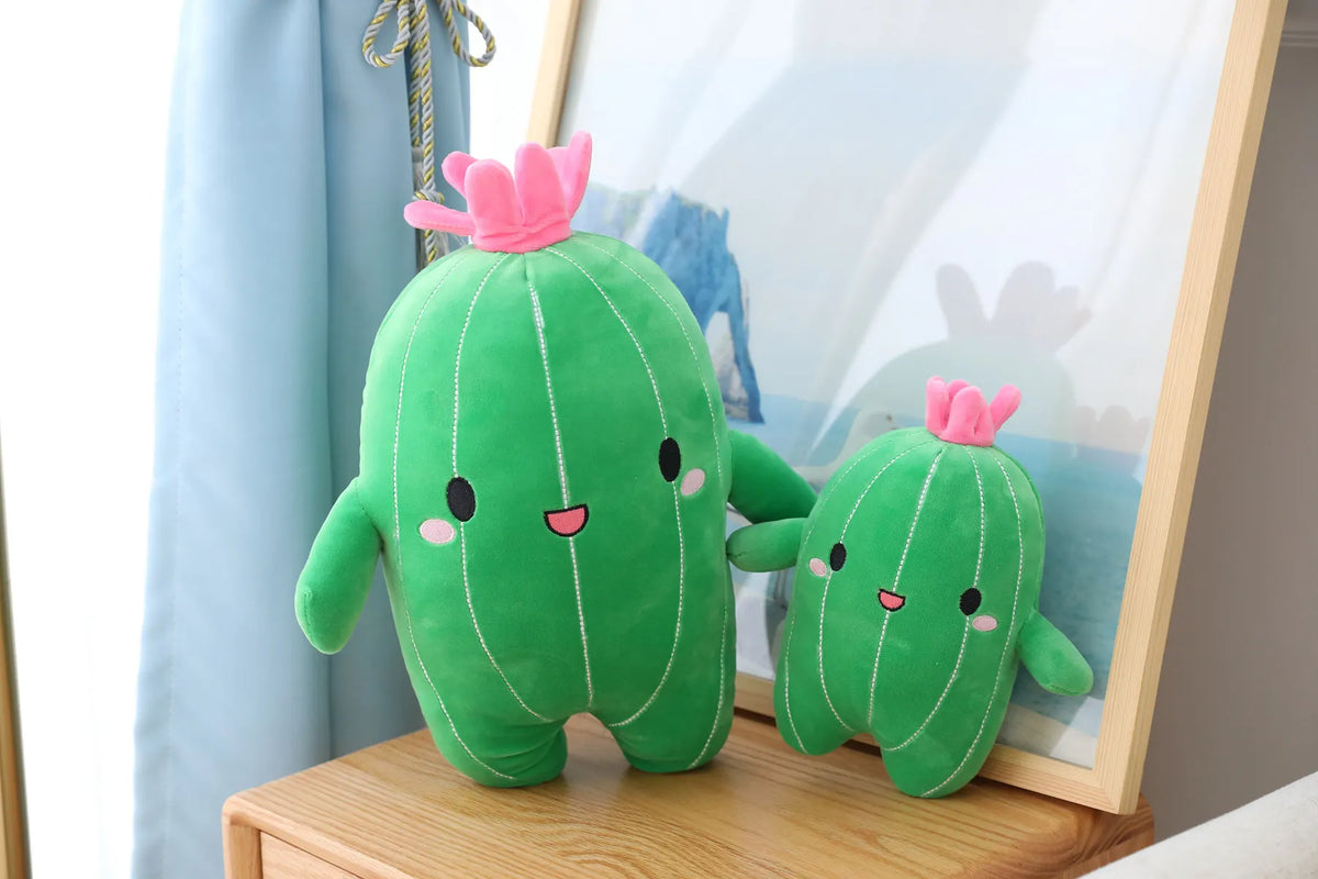 Kawaii plant plush and succulent plush styled together in a shelf display