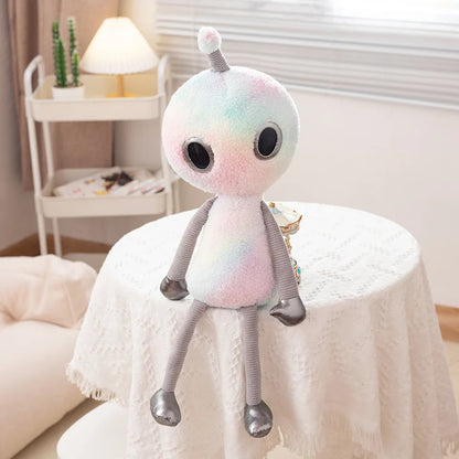 Kawaii space girl plush green alien on desk as cute bedroom decor
