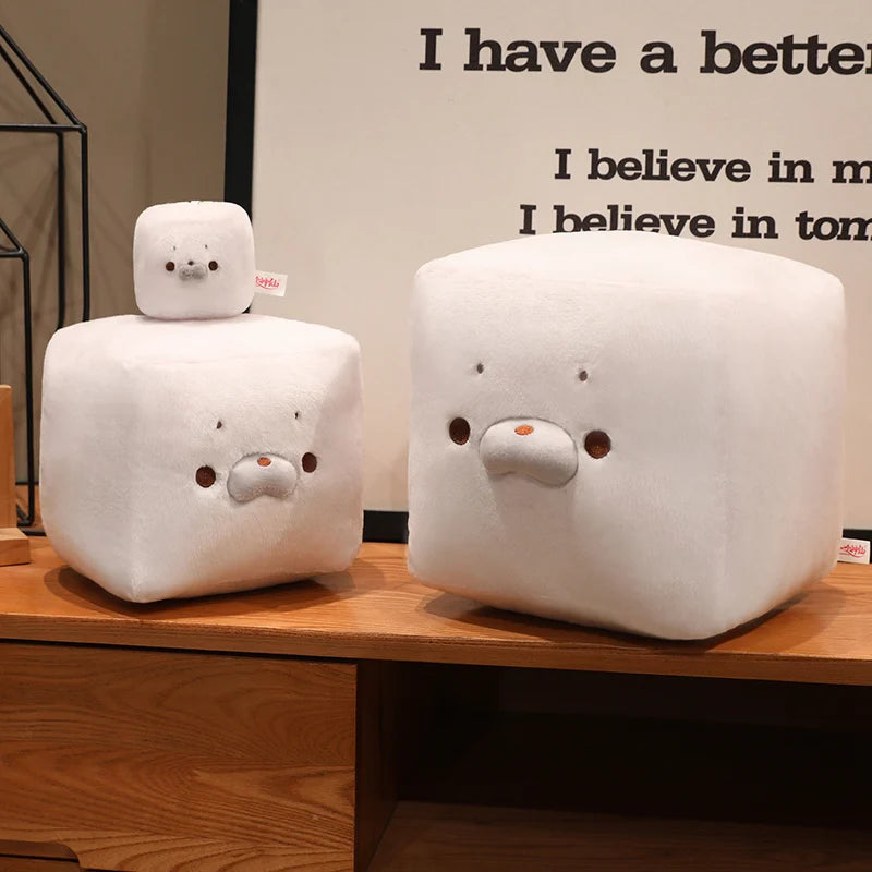 Kawaii tofu seal plush 22cm variant sitting next to anime figurines collectible display