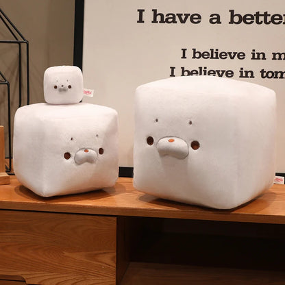 Kawaii tofu seal plush 22cm variant sitting next to anime figurines collectible display
