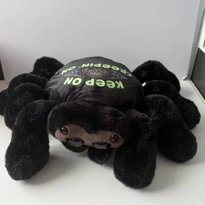 Keep On Creepin On text printed on back of black halloween spider plush