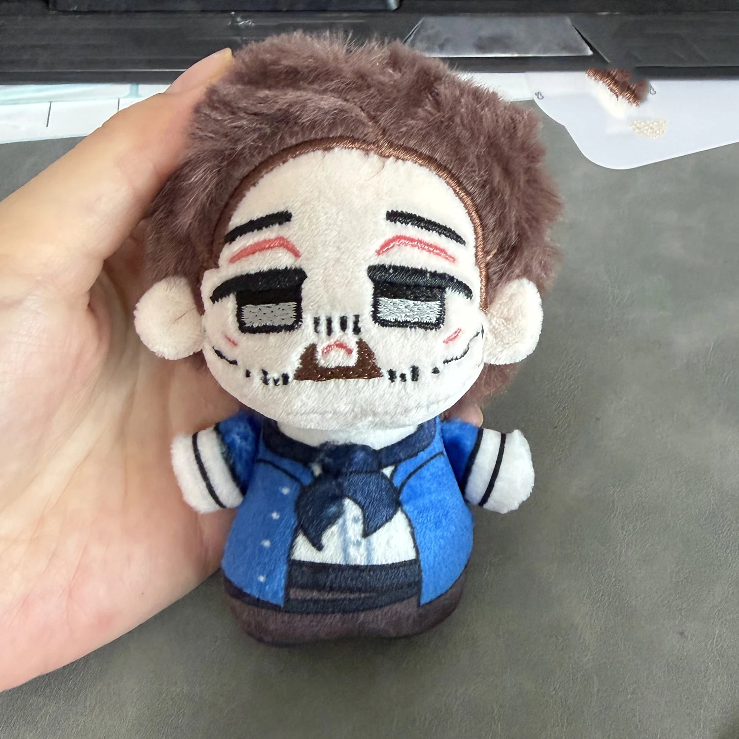 Kieran Duffy plush and Javier Escuella plush shown separately side by side
