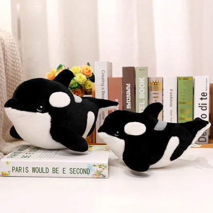 Killer whale plush toy detail shot showing double-stitched seams
