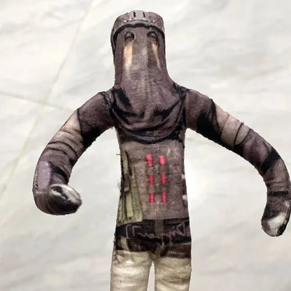 Konig plush soft toy hooded giant operator character close-up
