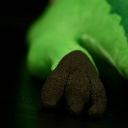 Large dinosaur stuffed animal Spinosaurus green plush 45cm top view showing full dorsal sail