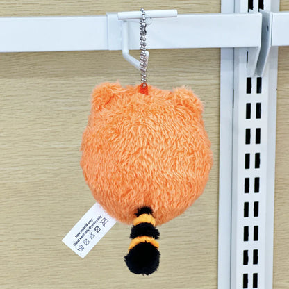 Leon Kennedy plush keychain attached to backpack zipper

