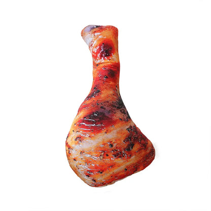 Lifelike 3D chicken leg plush toy on a clean white background