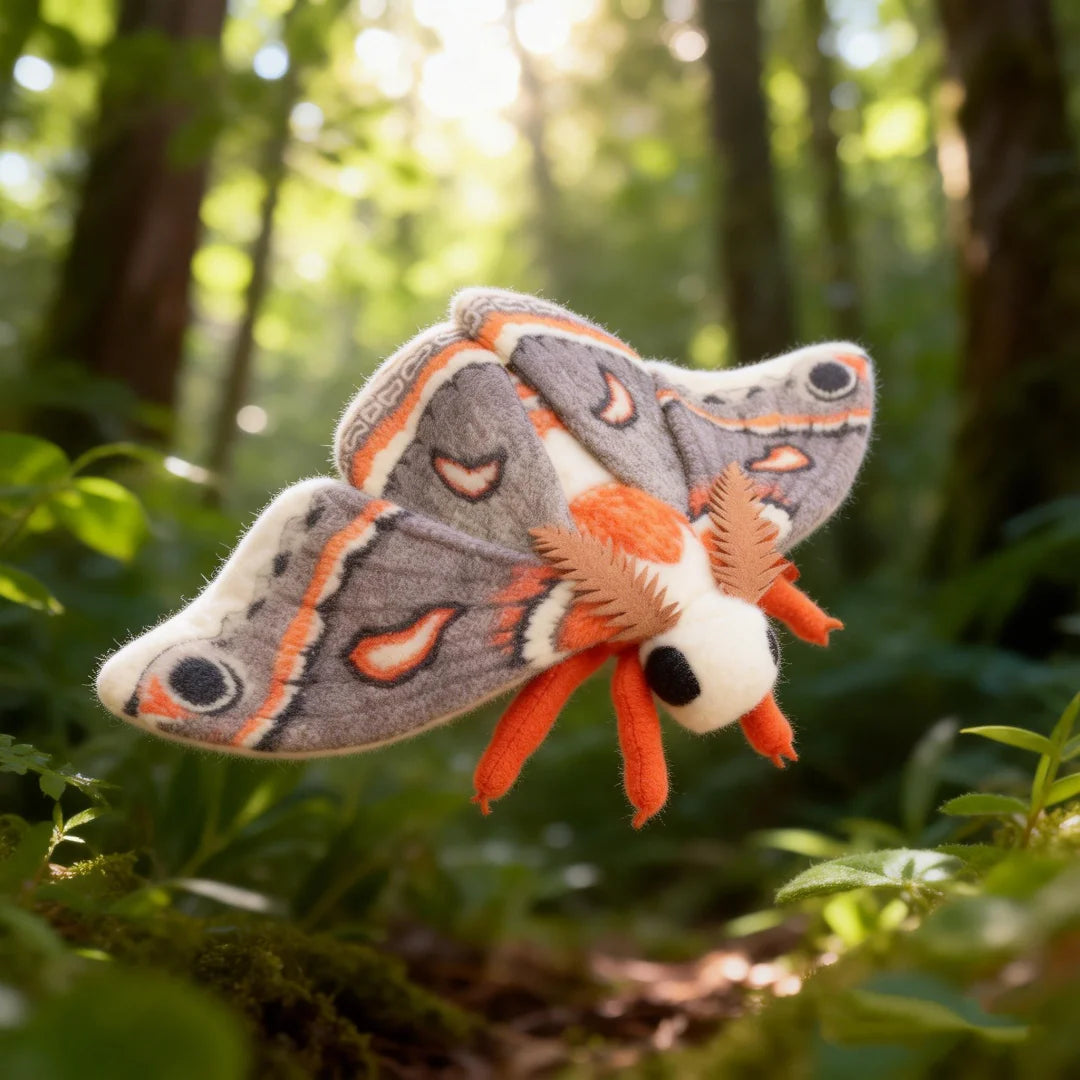 Lifelike Cecropia Moth plushie with fluffy red and orange wing accents close up