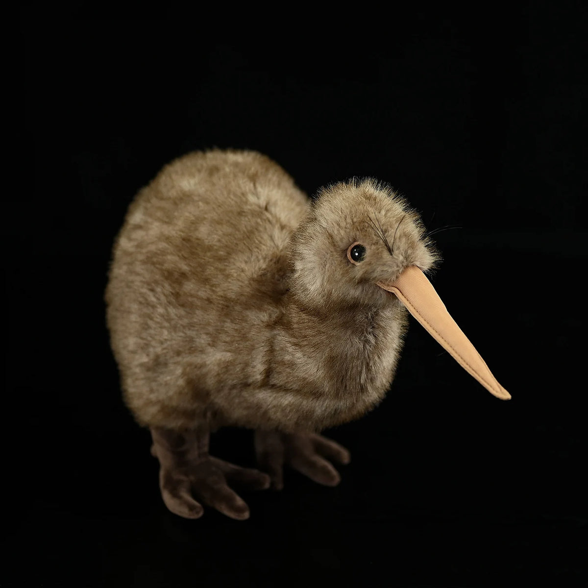 Lifelike kiwi bird stuffed animal with long beak closeup detail