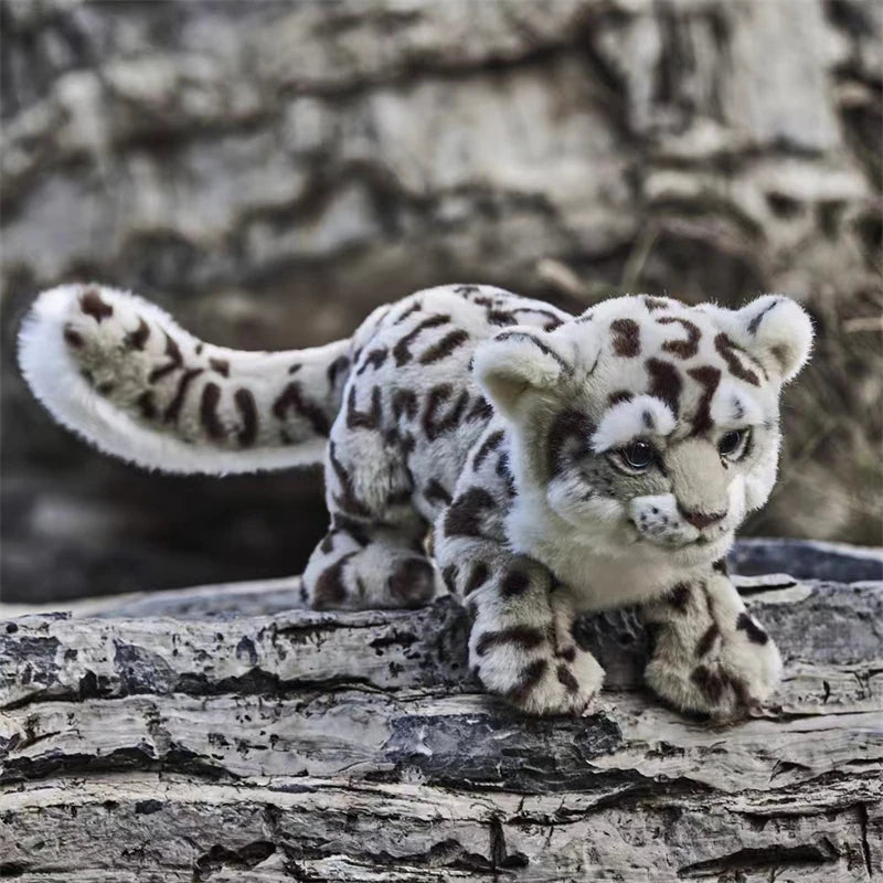 Lifelike snow leopard stuffed animal with detailed spotted coat