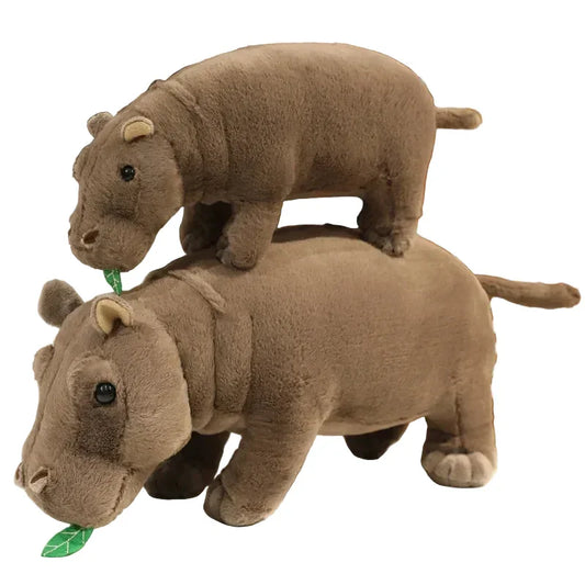 Lifestyle image of the cute hippo stuffed animal in a well-lit room