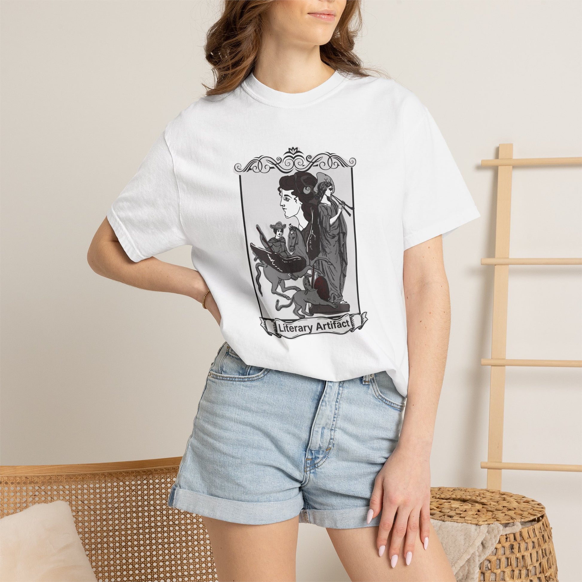 Literary Artifact gothic reader tee shown on a model in a library setting with bookshelves
