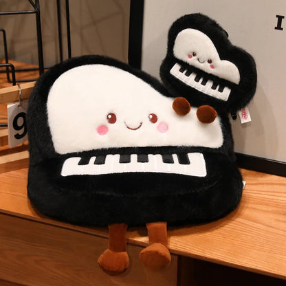 Lofi aesthetic desk setup with kawaii piano pillow beside a warm study lamp and potted plant