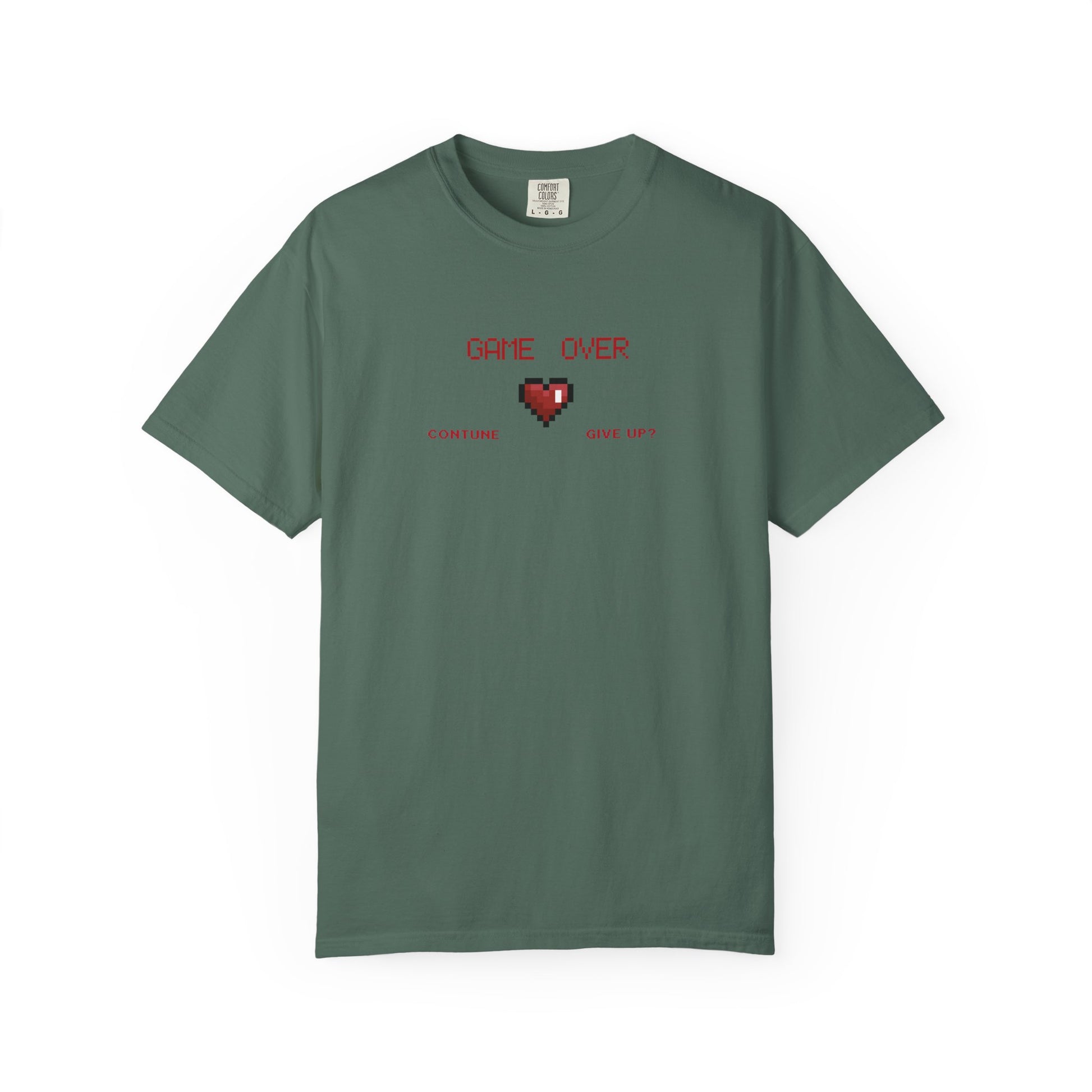 Macro detail of pixel art clothing chest print featuring damaged 8 bit heart and retro GAME OVER text
